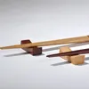 Din sets sets 12 pc's enkele concave eetstokje ruststokjesrek Japanse houder houten huis