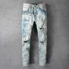 Jeans da uomo Abbigliamento firmato Amires Pantaloni denim Amies 697 Street Lettera rotta Adesivo Panno usato Lavaggio Acqua Elastico Fit Ins BluONU1