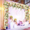 Arco artificial Fila de flores Camino de mesa Centros de mesa Cadena para fiesta de bodas Decoración de flores citadas 10 piezas cada lote 274K