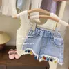 Kläderuppsättningar HTSU -flickor sommardräkt 2024 Kids Sticked Tank Top Children's Tassel Elastic midje denim Shorts Tvådel Set Qt0006