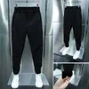 Pantaloni da uomo Pantaloni lunghi larghi e larghi stile sportivo da tennis casual con polsini con nastro elastico in vita per l'autunno/inverno