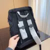 Erkekler ve Kadınlar İçin Yeni Backpacke Son 2023 Yüksek Kaliteli Backpack Drawstring Tokalı Stil Okul Çantası Geniş Omuz Kayışı Dağcılık Çantası Seyahat Çantası P2412