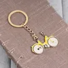 Keychains Gold Color Metal Sporty Man Road Bicycle Figure Keychain Keyring Trinket Souvenirs Creative for Bike Cycling Lover Biker