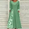 Casual jurken Dames Bedrukte jurk Elegante bloemenprint V-hals Midi met geplooide A-lijn zoom Knoop Decor Voor Dames Herfst Lente Garderobe