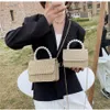 أزياء القش المنسوجة أكياس الكتف للنساء الصيفي شاطئ خمر Clamshell Crossbody حقيبة أنثى مصممة الذهب حقائب اليد sac248i