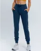 LU-2014 Kadın Yoga Kıyafeti Yeni gündelik hızlı kuruyan elastik bel all-in-one çalışan spor pantolonları fitness ince ve bacak bağlayıcı eşofman
