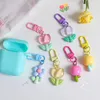 Keychains Fashion Colorful Resin Sunflower Tulip Key Chain Girl Cute Sweet Flower Bag Pendant Earphone Decoration Keychain