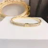 Specja Modna Boguła 18K Gold Gold Bracelets Błyszczące wysoko wypolerowane cienkie, szerokie duże, wysoka popularna bransoletka marki 289V