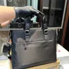 Valigetta di design Valigette da uomo Borse per laptop di lusso Borsa da lavoro Borse per computer Moda Pelle di alta qualità 38 * 6 * 29 cm