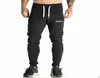 WholeMens Спортивный костюм Низ Хлопковые Узкие бегуны для фитнеса Спортивные штаны Pantalones Chandal Hombre Повседневные брюки Хлопковые Streetwea6987860