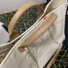 Diseñador de lujo Bolsa de playa Pearl Shopper Bolsas Bolso Mujer La bolsa de asas Lienzo Moda para hombre Crossbody Lino Deauville Vacaciones Viajes Lady Monederos de hombro