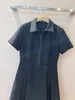 Robe pour femmes marques de mode européennes mini robe noire à manches courtes et col à revers