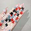 Nail Art Dekorationen 1 Packung 3D-Band-Harz-Bogenteile 50/100 Stück Schwarz-Weiß-Bowknot-Dekoration für DIY koreanischen Schmuck Maniküre-Zubehör