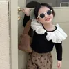 秋の女の子の長袖Tシャツの子供ファッション