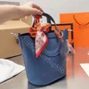 Hochwertige Designer-Tasche, die Einkaufstasche für Damen, modische Beuteltasche, Handtasche, goldene Schnalle zum Öffnen und Schließen, Korbtasche aus Kalbsleder, Schweinsnase-Tasche, Handtasche