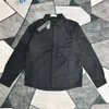 Yeni taş aşağı ceket pusula ceket gömlekleri su dirençli metal cilt naylon balıkçı dağcılık aşınma tasarımcısı siyah katlar erkek moda taş ceket 785