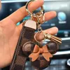 T GG Designer Keychain Wallet Keyring Fashion Purse Pendant Chain Charm Bucket Bag Flower Mini Coin Holder Keychains Bag Trinket Gifts Tillbehör