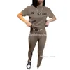 Abbigliamento da donna design moda tuta yoga Silm Pantaloni Completo Ragazza Due pezzi Jogger Set Nuove lettere stampate Manica corta Moda sexy Collant Abiti
