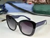 Nouveau design de mode lunettes de soleil œil de chat 0860S monture en acétate classique style simple et populaire lunettes de protection polyvalentes en plein air UV400