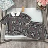 Luxury Kids Dress Sets Child Tracksuits Plaid Printing Baby Girl Clothes Size 100-150 Doll Collar Kort ärmar och kjol 24Feb20