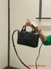 Botte Venetas Arco Bolsas Bolsas de couro genuíno 23 anos Nova sacola de cor sólida tecelagem de couro moda fivela magnética tendência casual portátil OneHB com logotipo