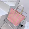 Strandsäckar Designer Totebag 2024 Summer Stripe Designer Men Women Bag Woman Het Luxury Handbag Summer Shopping Purse Totes Shoulder Handbags Triangle T240301