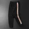 Designer masculino calças casuais sweatpants coreano juventude leggings checker pant homem moda esportes calças casuais