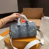 Kot çanta tasarımcısı tote çanta kadınlar vintage çiçek baskı el çantaları keepall crossbody omuz çantaları moda sokak yastık çantaları 240301