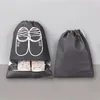 Sacos de armazenamento 1 pc impermeável sapatos saco portátil viagem feixe boca não tecido organizador de lavanderia sneaker tote bolsa de cordão