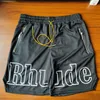 Shorts pour hommes de concepteur Lâche et séchage rapide Sports Basketball Running Longueur du genou Shorts décontractés pour hommes