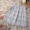 Röcke Zoki JK Frauen Plaid Rock Sommer Hohe Taille Einstellen Knopf Mädchen Plissee Japan Student Nette Blaue Schleife Schule Mini