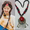 Naszyjniki wiszące Chińskie mniejszości etniczne charakterystyczne cechy ryżowe Naszyjnik damski długi tybetański odzież Akcesoria Sweter