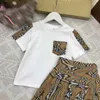 Ensembles de robes pour enfants de mode Child Tracksuit Baby Girl Clothes Taille 110-160 Patchwork à carreaux T-shirt à manches courtes et jupe 24Feb20