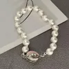 Bracciale di lusso di fascia alta di design con fibbia magnetica Saturno, braccialetto di perle, smaltato, pianeta ovale, braccialetto regalo di Natale