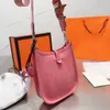 Bolsa de designer de alta qualidade feminina bolsa crossbody elegante bolsa de prata botão impressão couro e lona alças de ombro bolsa crossbody