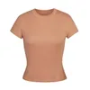 T-shirt firmata Top t-shirt a maniche corte in cotone filettato elasticizzato fondo girocollo