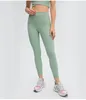 Pantaloni attivi Yoga all'aria aperta da donna a vita alta e sollevamento dell'anca Legging Abbigliamento nudo Sport ad asciugatura rapida Corsa Fitness Nove punti