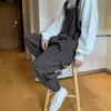 Sırıştırıcılar tulum pantolon erkekler yaz tulumları Japon gevşek kayışlar gündelik cepler unisex büyük sokak kıyafetleri katı adam giyim 240228