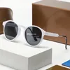 Nouveau créateur pour les lunettes de soleil polarisées de mode UV Men de soleil résistant aux femmes lunettes de soleil rétro en verre de soleil