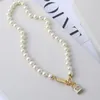 Designer's New Saturn Brand Resin Lacquer Solid Lock Pearl Necklace Fashionable and Noble Necklace