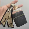 Lipstick Bag Keychains Letter Silk Scarf Nyckelkedjor Ring Fashion Design Pu Leather Coin Purse Case Pendant Keyring Charm smycken för kvinnliga gåvor Multicolor