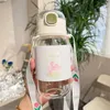 Butelki z wodą Tulip Glass Cute Bottle Cover Strap Girls 400/450 ml Sok kawy kubki mleczne Przenośne picie Nordic Praktyczne nowoczesne