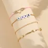 Braccialetti con ciondoli Miss JQ 4 pezzi/set braccialetto di perline con lettera bohémien AMORE per braccialetti da donna, gioielli da viaggio, feste