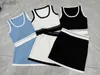 Basic casual jurken stuk jurk gebreid vest mini korte rok streetwear crop top klein 4 kleuren gebreid trainingspak 240302