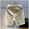 Designershorts, modieuze en casual strandshorts, shorts met letterprint, veelzijdig en trendy merk, zomersport high street losse casual shorts