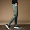 Pantaloni Oussyu di alta qualità in pile invernale caldo velluto a coste pantaloni da uomo spesso casual business moda velluto elasticizzato nero grigio verde pantaloni