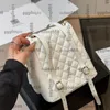 Klassisk mini -klaff gabrielle dragstring ryggsäckväskor kohid kaviar läder ghw crossbody axel handväskor vänd lås utomhus daglig outfit handväska 20 cm 4 färger