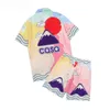 カサブランカデザイナーTシャツTshirtsデザイナーマン2ピースセット女性ショーツセット印刷されたメンズカジュアルシャツ女性ゆるいシルクカサブランカシャツ短袖ラグジュアリーティー