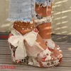 Sandales compensées à motif floral pour femmes, chaussures décontractées à bout ouvert, confortables, décor avec nœud papillon