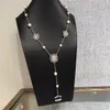 خريف وشتاء سلسلة سترة C Designer Necklace لسلاسل لؤلؤة السيدة العلامة التجارية الذهب الكريستال المجوهرات الفاخرة cclies المرأة سلسلة طويلة 32